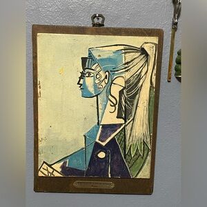 “Portrait of a Young Woman” Pablo Picasso on a leather canvas, w/wooden plaque.